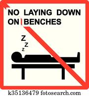 No laying down on benches Sign