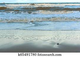 sea wave, storm at sea, waves lapping on the shore