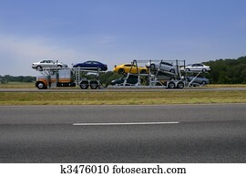 Truck on the road with colorful cars transport Truck on the road with colorful cars transport