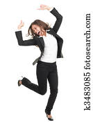 ecstatic businesswoman in suit dancing