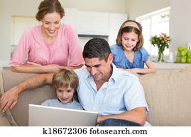 Family using laptop