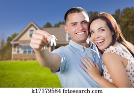 Military Couple with House Keys In Front of New Home Military Couple with House Keys In Front of New Home