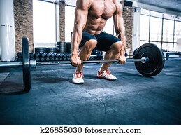 muscular man workout with barbell muscular man workout with barbell