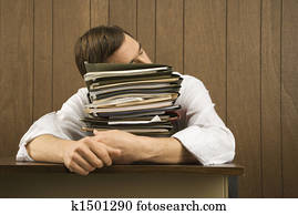 Man sleeping at work.