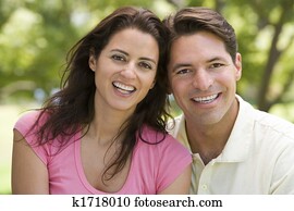 Couple outdoors smiling