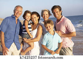Portrait Of Three Generation Family On Beach Holiday Portrait Of Three Generation Family On Beach Holiday