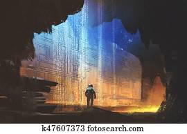 the astronaut looking at pattern on the rock wall the astronaut looking at pattern on the rock wall