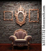 illuminated stone wall and chair