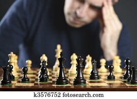 Man at chess board
