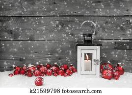 White shabby chic latern for christmas with candle and red balls White shabby chic latern for christmas with candle and red balls
