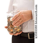 Senior man hands holding jar with coins