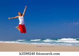 Young woman jumping