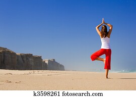Young woman making Yoga