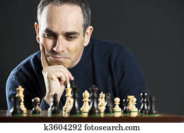 Man at chess board