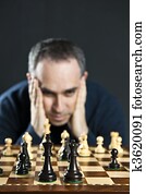 Man at chess board