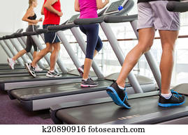 Row of people on treadmills Row of people on treadmills