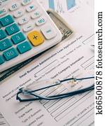 small business loan application on the desk.