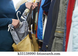 Woman Stealing Clothes From Store Woman Stealing Clothes From Store