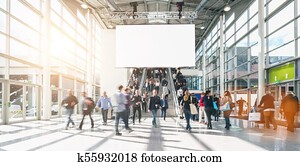 large crowd of anonymous blurred people at a trade show, including copy space banner large crowd of anonymous blurred people at a trade show, including copy space banner