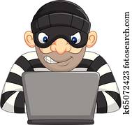 Hacker Thief in mask stealing personal information from computer Hacker Thief in mask stealing personal information from computer