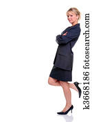 Blond businesswoman in suit leaning