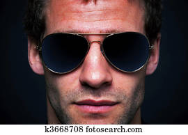 Man wearing aviator sunglasses