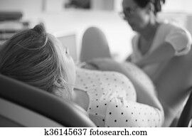 Pregnant woman at gynecologist Pregnant woman at gynecologist