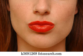 Woman with lips pursed for a kiss Stock Image | bn251102 | Fotosearch