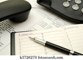 Black pen on planner