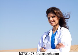 pretty arabic nurse on beach