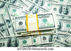 Stack of dollars on money background