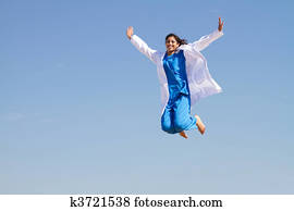 young resident jumping high in sky