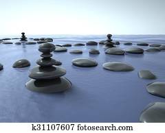 Zen stones in water, blue sky Zen stones in water, blue sky
