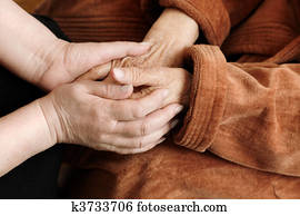 adult helping senior 