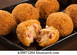 Brazilian deep fried cheese and ha snack, popular at local parties. Served with chili sauce.