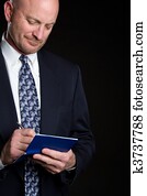 Businessman Writing Check