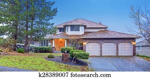 Traditional brick house with garage.