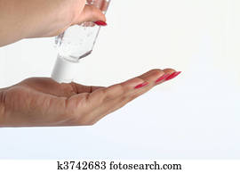 Using hand sanitizer - Hygiene concept Using hand sanitizer - Hygiene concept