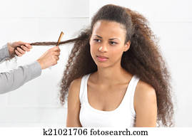 African woman at the hairdresser African woman at the hairdresser