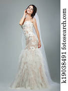 Dreaminess. Full Length of Happy Bride with Closed Eyes in Sleeveless White Dress