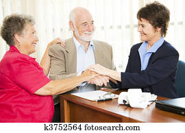 Senior Business Group Handshake