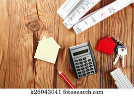 Assorted Items on Wooden Table for Realty Concept