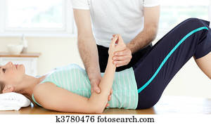Attractive young woman receiving a massage 