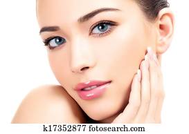 Beautiful girl with clean fresh skin, white background Beautiful girl with clean fresh skin, white background