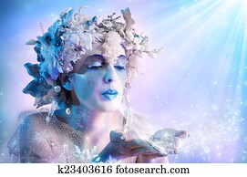Winter portrait blowing snowflakes Winter portrait blowing snowflakes