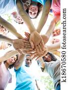 Friends stacking hands