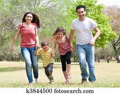 Family running on the park