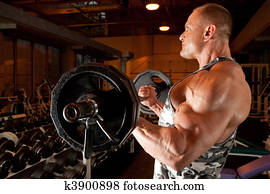 bodybuilder in training room bodybuilder in training room