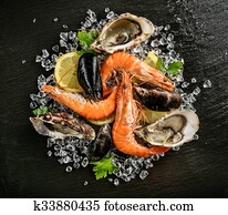 Seafood served on black stone Seafood served on black stone