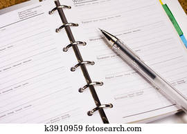 pen on schedule book pen on schedule book